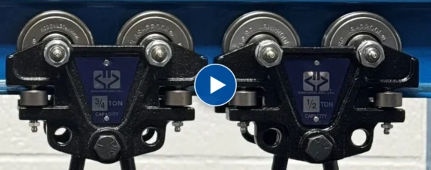 Two Frost hand pushed I-beam trolleys, 3/4 ton and 1/2 ton capacity