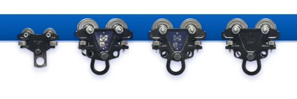 Frost hand-pushed I-beam trolleys, 1/4, 1/2, 3/4 and 1 ton, on a blue I-beam